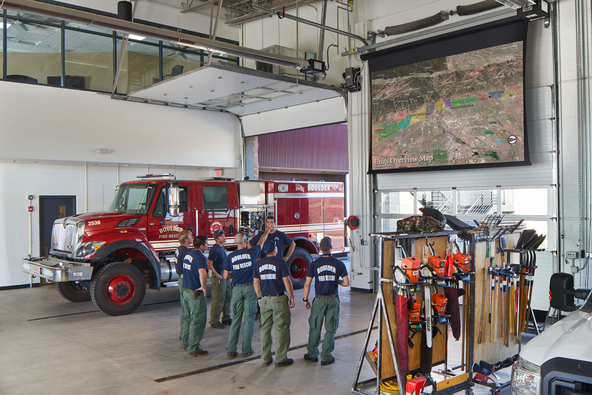 An under construction image of the inside of a large commercial garage that was part of a Les Schwab Tire Center built by an automotive contractor in Colorado.